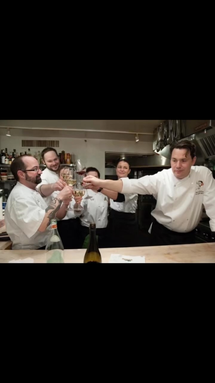 Chef plating a fine dining dish